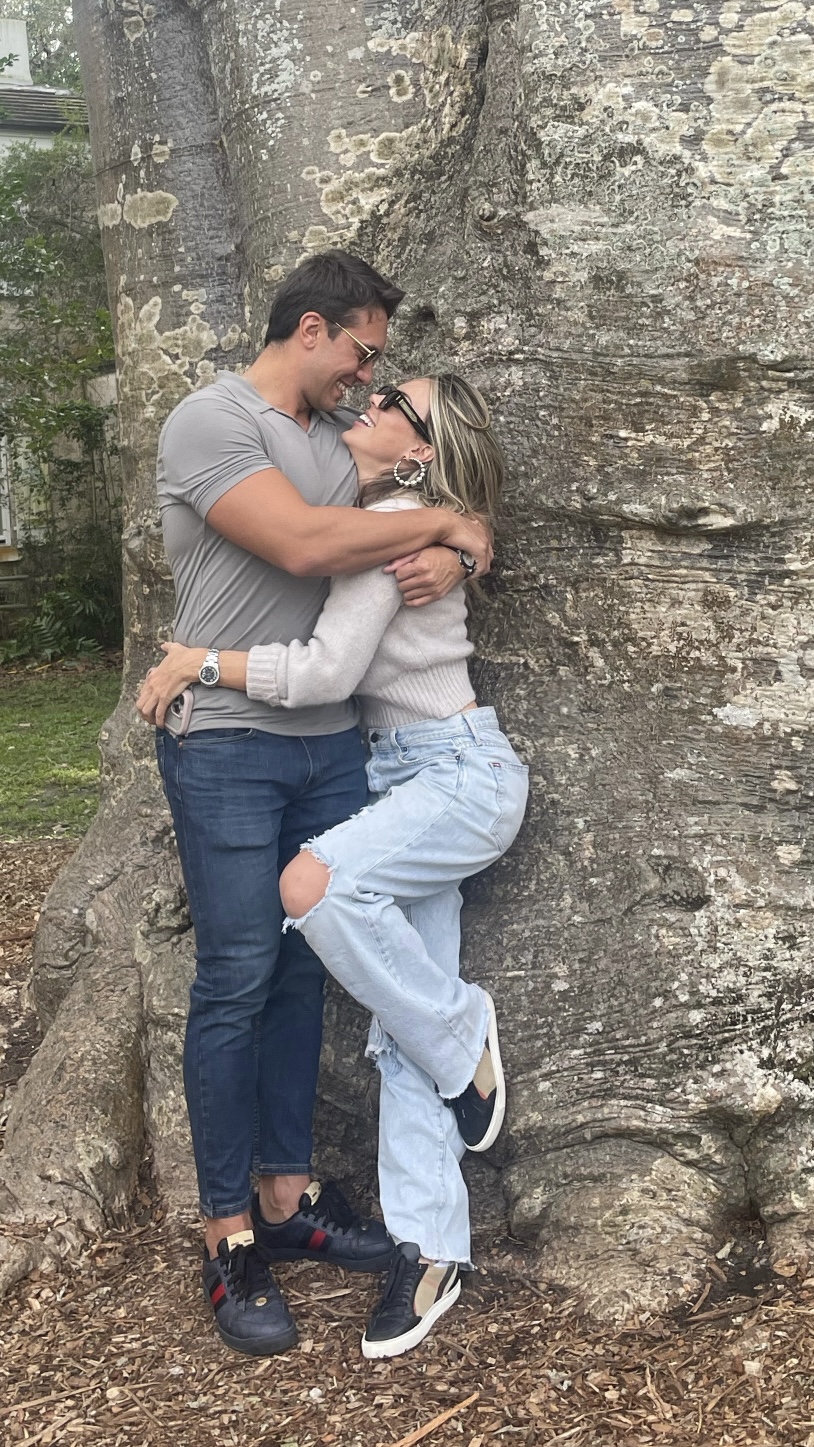 An embrace beneath the trees